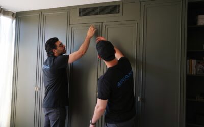 Airvana engineer installing AC